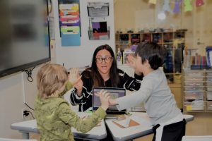 Applied Behavior Analysis (ABA) session at Tribeca Prep, NYC special education school supporting children with autism and learning differences. ABA therapy in classroom | Tribeca Prep NYC autism and special education school